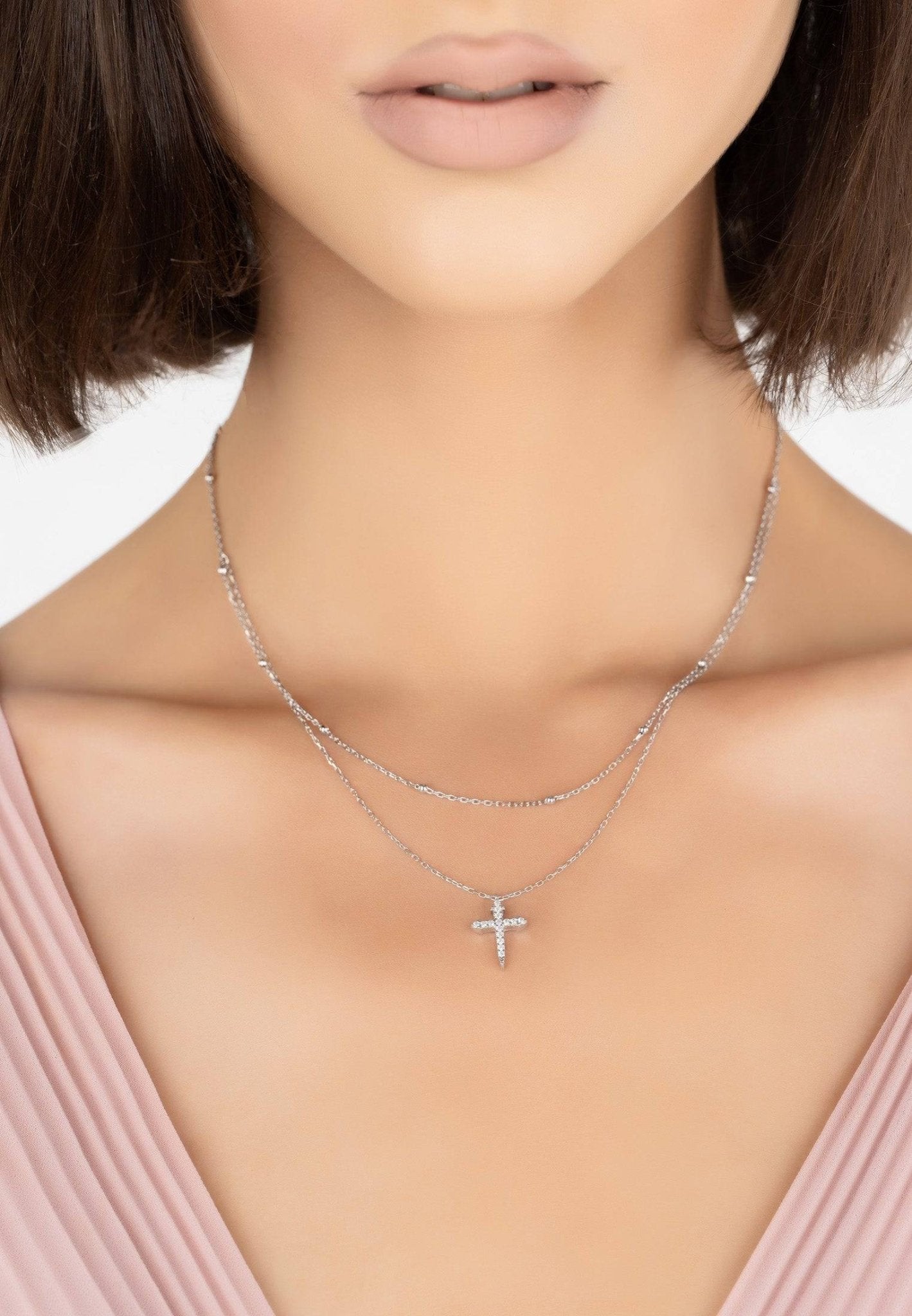 Double strand clearance cross necklace