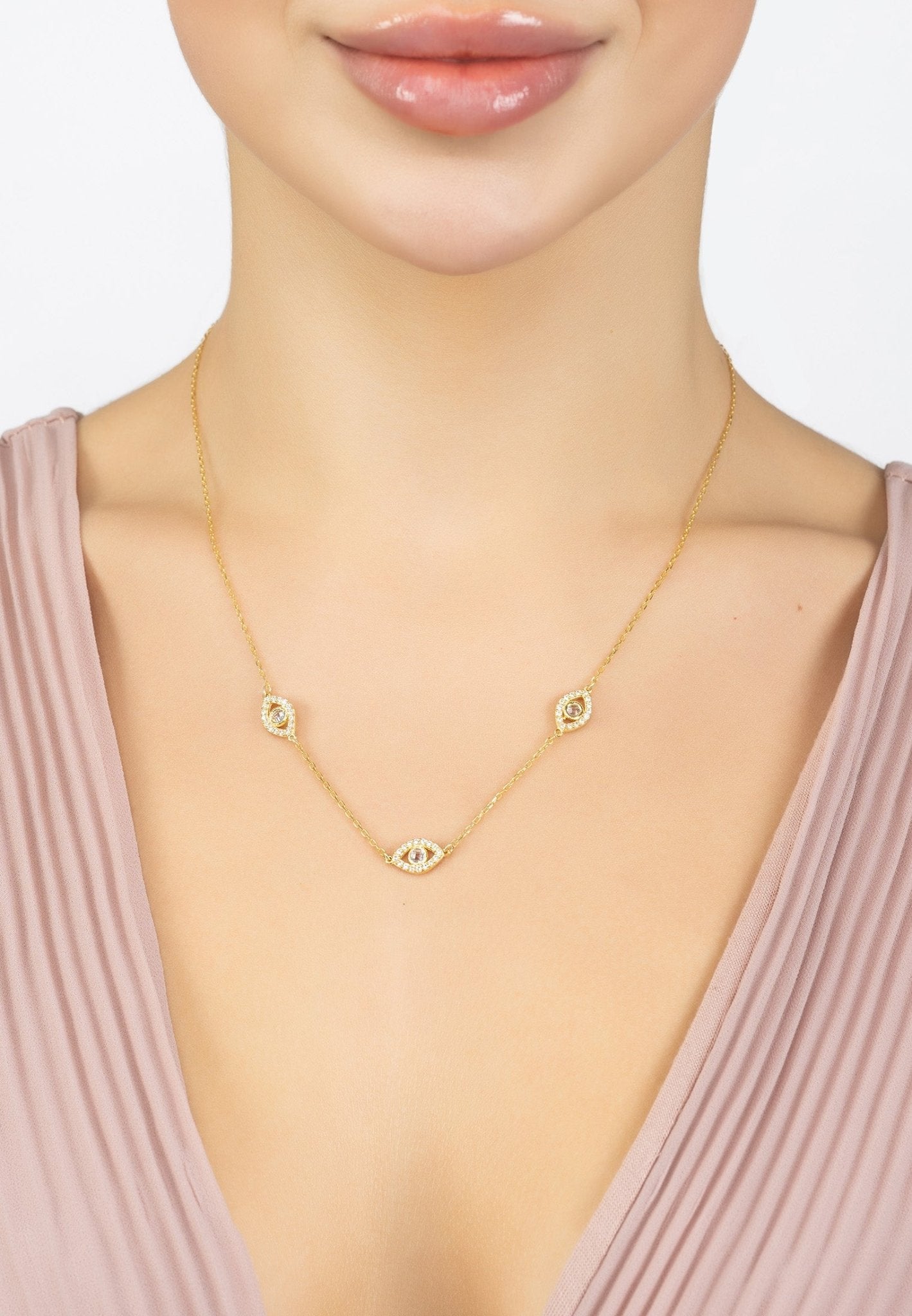 Triple Elliptical Eyes Necklace Gold